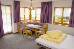 A bed or beds in a room at Pezza Lischa