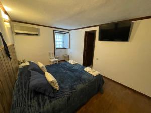 Uma cama ou camas num quarto em Casa da Cerca