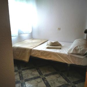 Posteľ alebo postele v izbe v ubytovaní PISO CENTRICO EN PUNTA UMBRIA