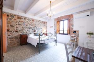 Postel nebo postele na pokoji v ubytování Casa Il giuggiolo