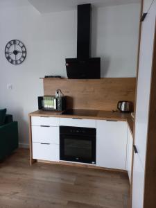 Kuchyňa alebo kuchynka v ubytovaní Apartamenty Termalne na Długiej 6