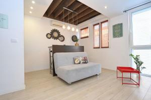 Posteľ alebo postele v izbe v ubytovaní Cardo Apartments