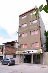 a building with a car parked in front of it at Munay Ledesma in Libertador General San Martín