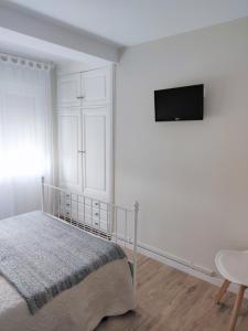 Posteľ alebo postele v izbe v ubytovaní -mdeMARÍA-