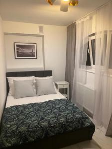 Postel nebo postele na pokoji v ubytování Apartamenty u Ewy - EUROS
