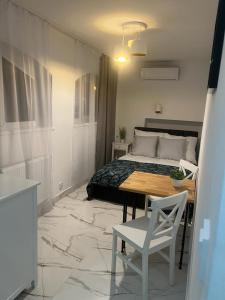 Postel nebo postele na pokoji v ubytování Apartamenty u Ewy - EUROS