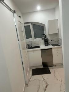 Kuchyň nebo kuchyňský kout v ubytování Apartamenty u Ewy - EUROS