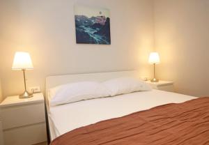 Postel nebo postele na pokoji v ubytování Apartment Volat