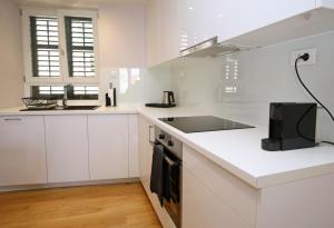 Kuchyň nebo kuchyňský kout v ubytování Apartment Volat