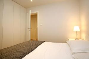 Postel nebo postele na pokoji v ubytování Apartment Volat