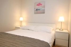 Postel nebo postele na pokoji v ubytování Apartment Volat