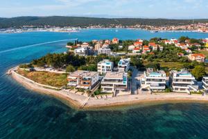 an aerial view of a small island in the water at Crystal Holiday Residence in Sukošan