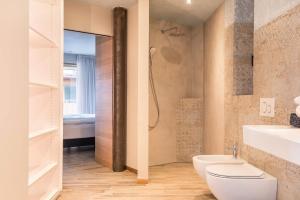 Koupelna v ubytování Aumia Apartment Saphir + 16 fotografií
