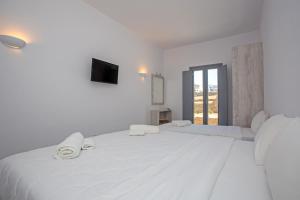 Foto da galeria de Katikies Ftelia Mykonos em Panormos Mykonos