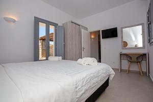 Foto da galeria de Katikies Ftelia Mykonos em Panormos Mykonos