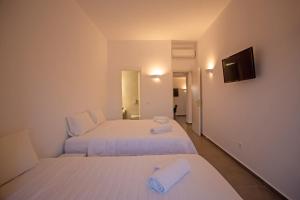 Foto da galeria de Katikies Ftelia Mykonos em Panormos Mykonos