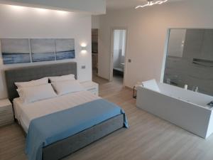 Posteľ alebo postele v izbe v ubytovaní Borgonuovo Luxury Home
