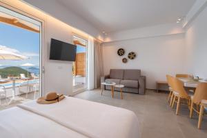 TV a/nebo společenská místnost v ubytování Ninemia Luxury Residence