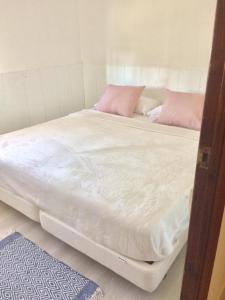 A bed or beds in a room at SITGES Apartment PALLARÉS