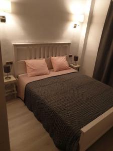 A bed or beds in a room at SITGES Apartment PALLARÉS