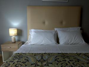 Posteľ alebo postele v izbe v ubytovaní Hospitable appartment in the central park, Xanthi