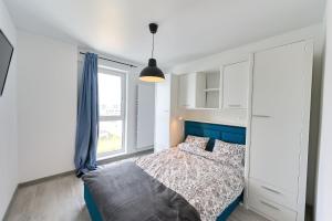 Un pat sau paturi într-o cameră la Apartament Andrei in Nord10 - pool n playground +27 fotografii