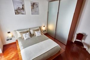 Posteľ alebo postele v izbe v ubytovaní Luxury Design Loft - [Piazza Pontida]