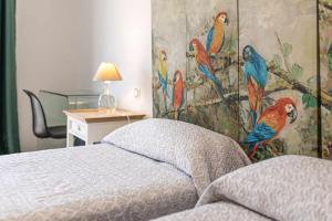 Łóżko lub łóżka w pokoju w obiekcie Villa Vulcano by Calima Villas