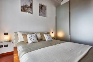 Posteľ alebo postele v izbe v ubytovaní Luxury Design Loft - [Piazza Pontida]