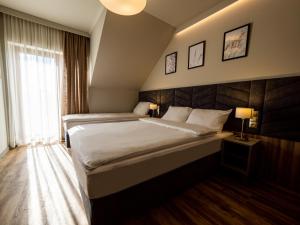 Villa & Gospoda Krakowska客房内的一张或多张床位