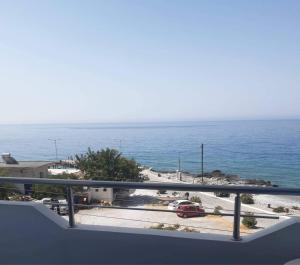 a view of the ocean from a balcony at Tarra in Agia Roumeli