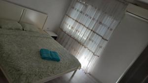 Postel nebo postele na pokoji v ubytování 7mi Septemvri