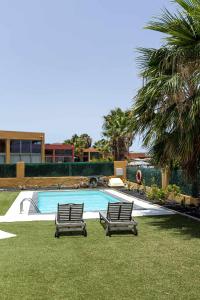 Basen w obiekcie Villa Vulcano by Calima Villas lub w pobliżu