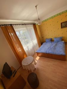 Postel nebo postele na pokoji v ubytování Willa Malwa