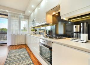 Η κουζίνα ή μικρή κουζίνα στο Apartament 14 +8 φωτογραφίες