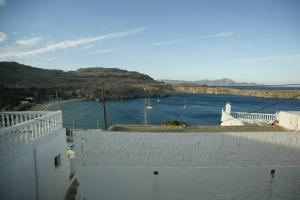 a view of a body of water from a building at Eugenia villa in Lindos