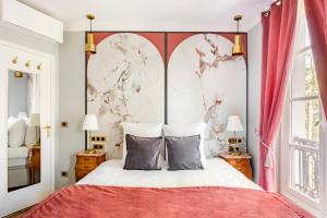 מיטה או מיטות בחדר ב-Luxury 3 bedrooms 3 bathrooms apartment in Le Marais