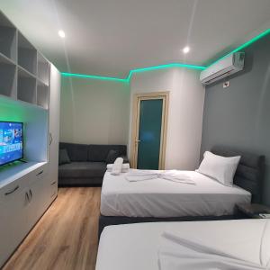 Säng eller sängar i ett rum på Villa Mehmeti