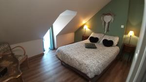 Posteľ alebo postele v izbe v ubytovaní Maison Coeur de Sancerre