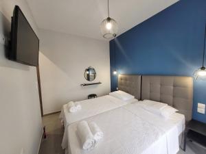 A bed or beds in a room at LA CASA DE PROFESOR 1