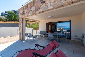 Balkón nebo terasa v ubytování L'Aurore de Cruciata - Appt vue baie d'Ajaccio