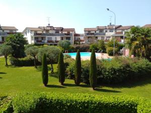 Bazén v ubytování Kibilù - Brebbia Bilocale con Piscina Parcheggio vicinanze Lago Maggiore nebo v jeho okolí