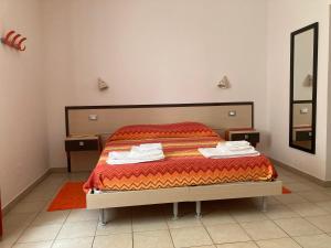Säng eller sängar i ett rum på Solìa Bed & Breakfast