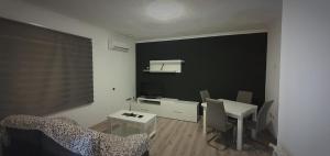Khu vực ghế ngồi tại APARTAMENTO DELUXE