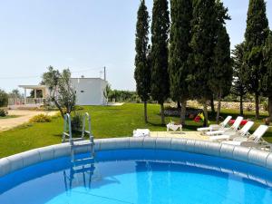 Bazén v ubytování Villa Aloha Torre Pali nebo v jeho okolí