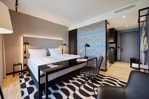 Postel nebo postele na pokoji v ubytování LÉGÈRE HOTEL Erfurt