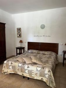 A bed or beds in a room at Agriturismo Corte San Girolamo