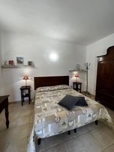 A bed or beds in a room at Agriturismo Corte San Girolamo