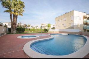 The swimming pool at or close to Comfort home Calafell