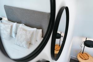Posteľ alebo postele v izbe v ubytovaní APARTAMENTOS VIRGEN DEL CARMEN